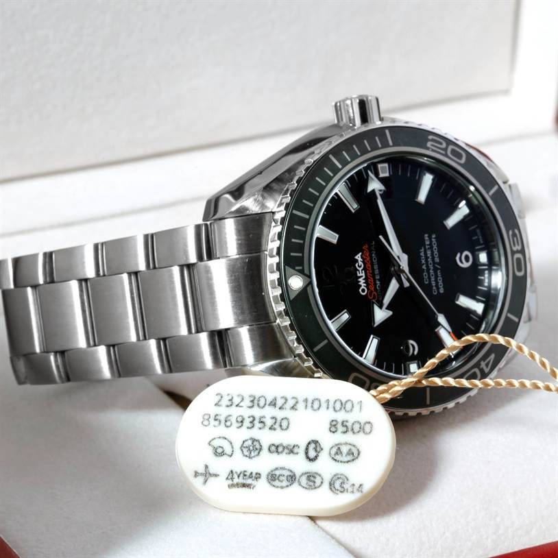 The image shows the front and side view of the Omega Planet Ocean 232.30.42.21.01.003 Men
s Stainless Steel Black Dial 232.30.42.21.01.003 Men
s Stainless Steel Black Dial watch, highlighting its dial, bezel, and metal bracelet.