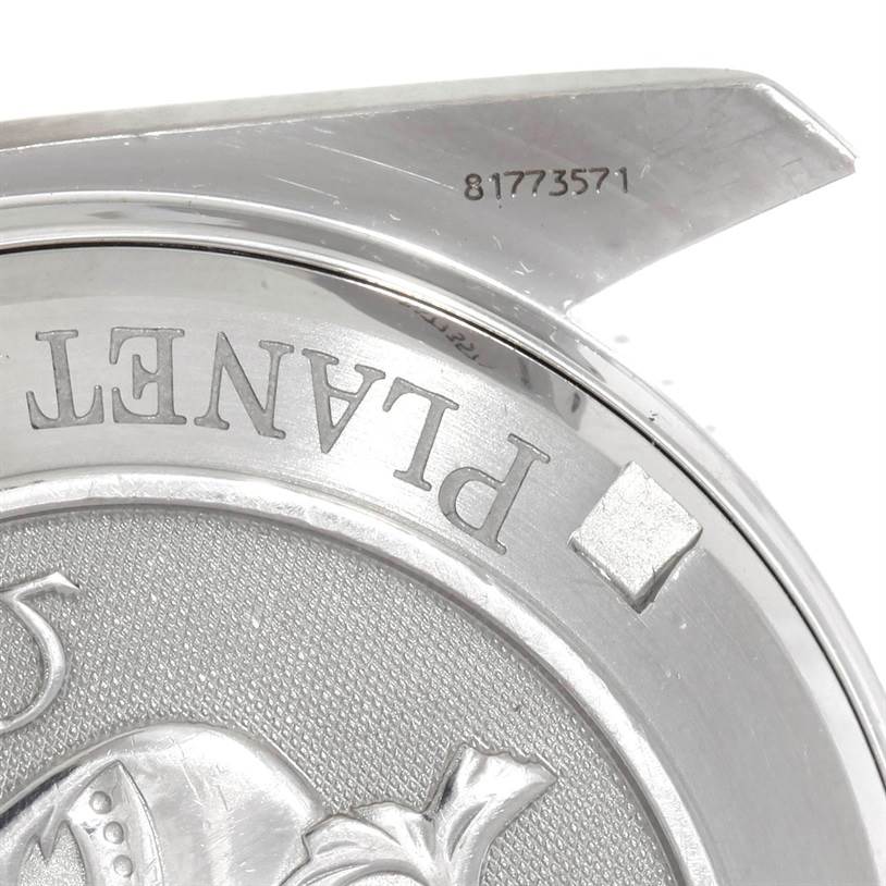 The image shows the back case of the Omega Planet Ocean 2201.50.00 Men
s Stainless Steel Black Dial 2201.50.00 Men
s Stainless Steel Black Dial watch, with part of the engraved logo and serial number.