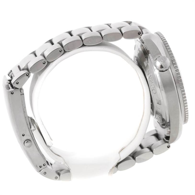 The image shows a side view of the Omega Planet Ocean 2201.50.00 Men
s Stainless Steel Black Dial 2201.50.00 Men
s Stainless Steel Black Dial watch, highlighting the bracelet links and case back.