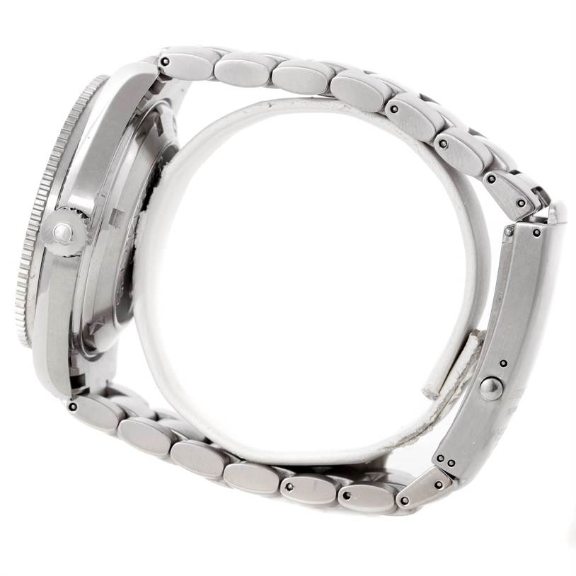 The image shows a side view of the Omega Planet Ocean 2201.50.00 Men
s Stainless Steel Black Dial 2201.50.00 Men
s Stainless Steel Black Dial watch, highlighting its case, bezel, and metal bracelet.