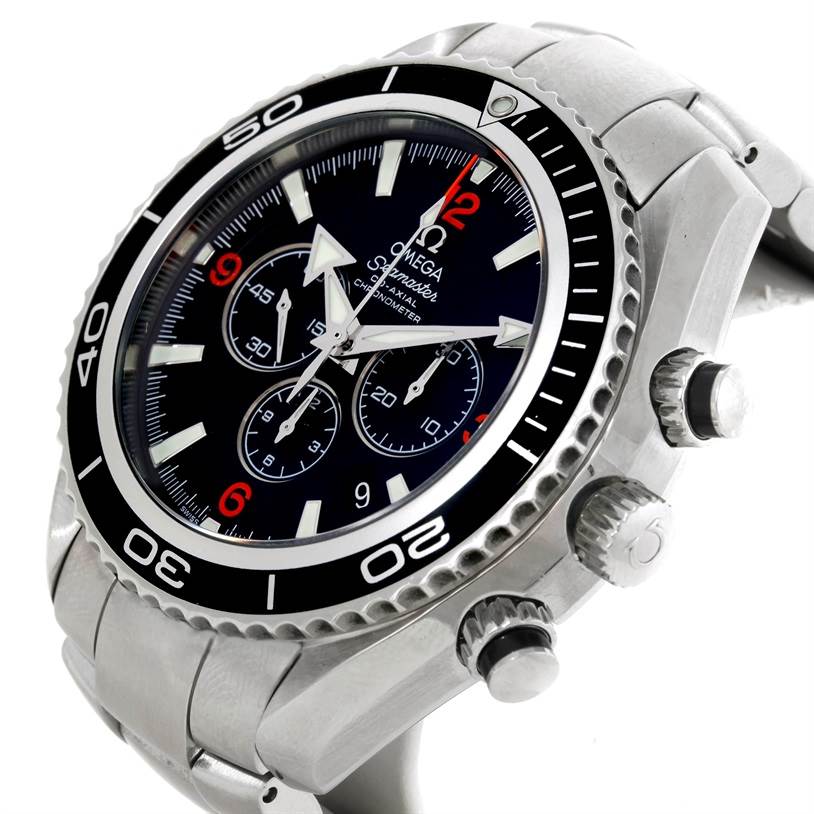 The image shows a side angle of an Omega Planet Ocean 2210.51.00 Men's Stainless Steel Black Dial 2210.51.00 Men's Stainless Steel Black Dial watch, highlighting the dial, bezel, crown, and chronograph pushers.