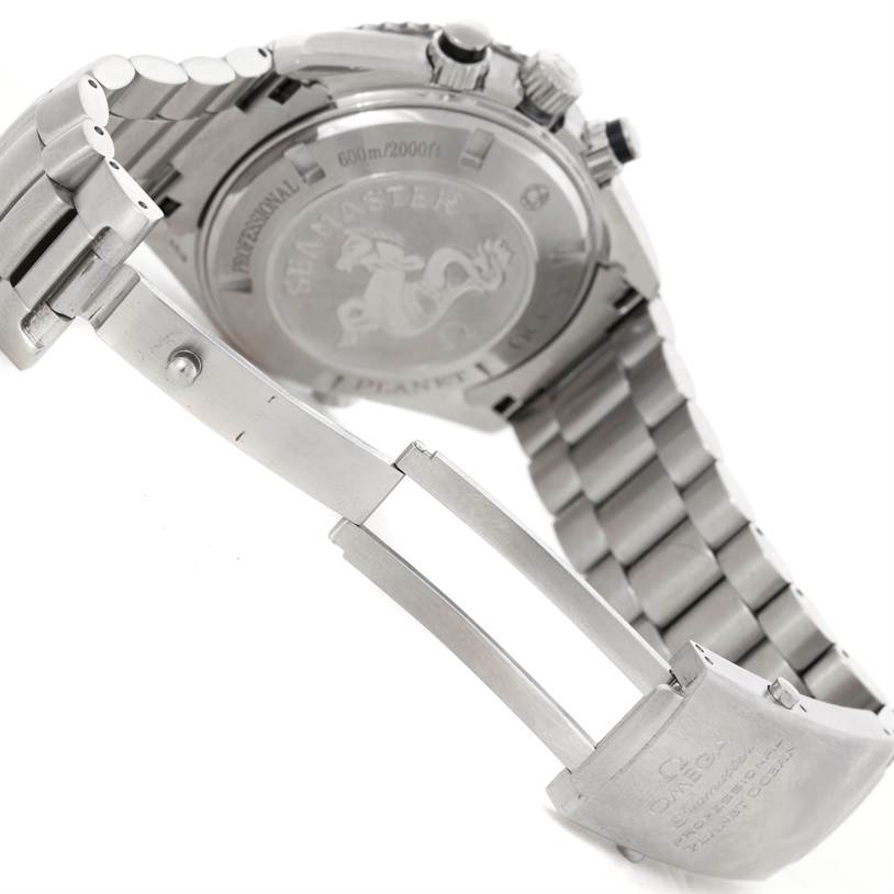 The image shows the case back and folded clasp of the Omega Planet Ocean 2210.51.00 Men's Stainless Steel Black Dial 2210.51.00 Men's Stainless Steel Black Dial watch, highlighting the engraved details and bracelet.