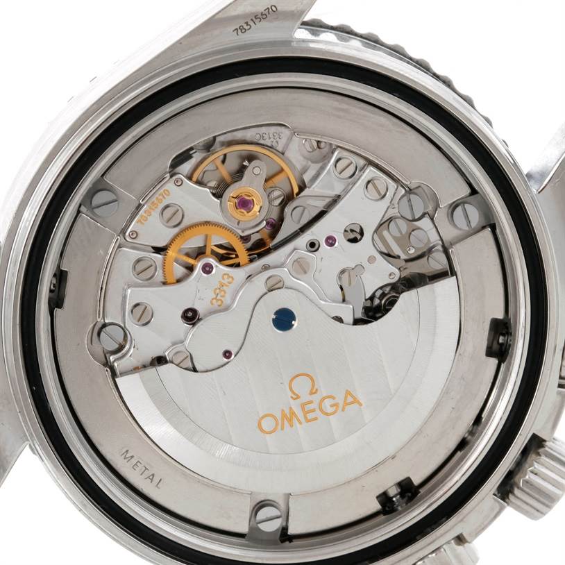 This is a close-up view of the internal mechanics of an Omega Planet Ocean 2210.51.00 Men's Stainless Steel Black Dial 2210.51.00 Men's Stainless Steel Black Dial watch, showing the movement and gears.