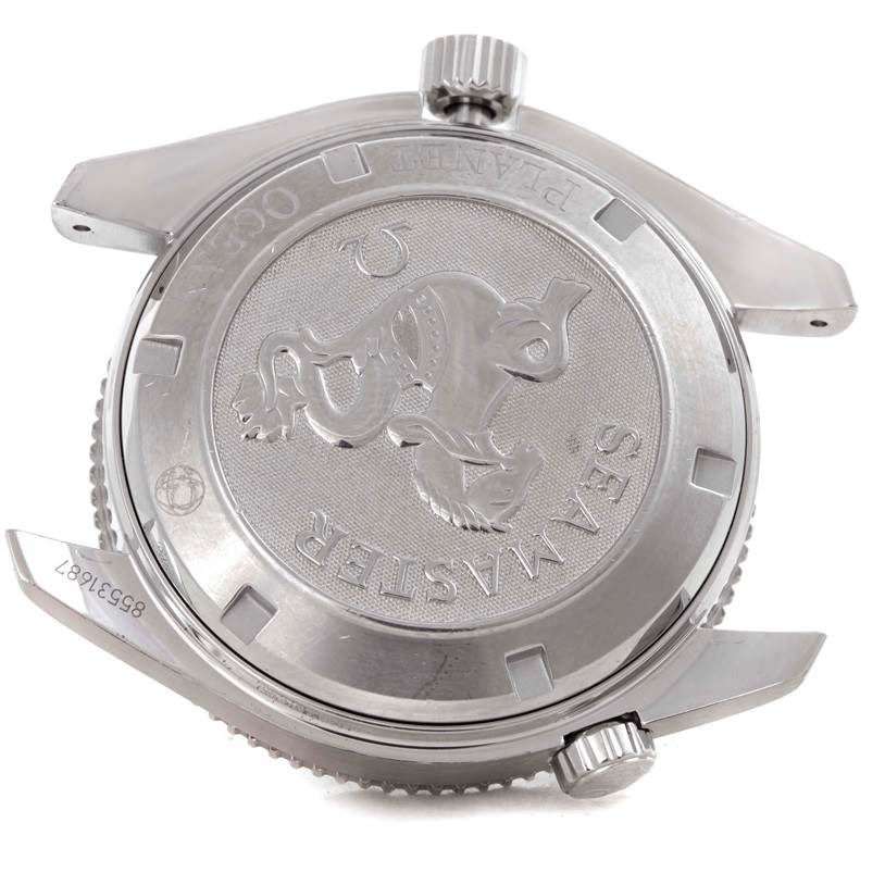 The image shows the back casing and crown of an Omega Planet Ocean 2201.51.00 Men's Stainless Steel Black Dial 2201.51.00 Men's Stainless Steel Black Dial watch, featuring the Seamaster logo.