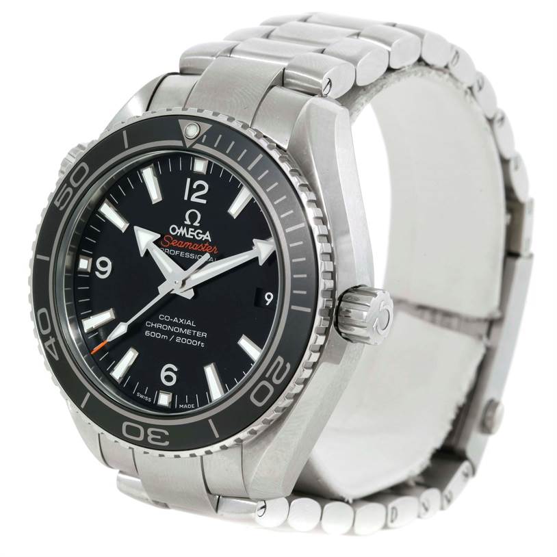 The image shows a three-quarters front view of an Omega Seamaster Planet Ocean watch, highlighting its dial, bezel, and bracelet.