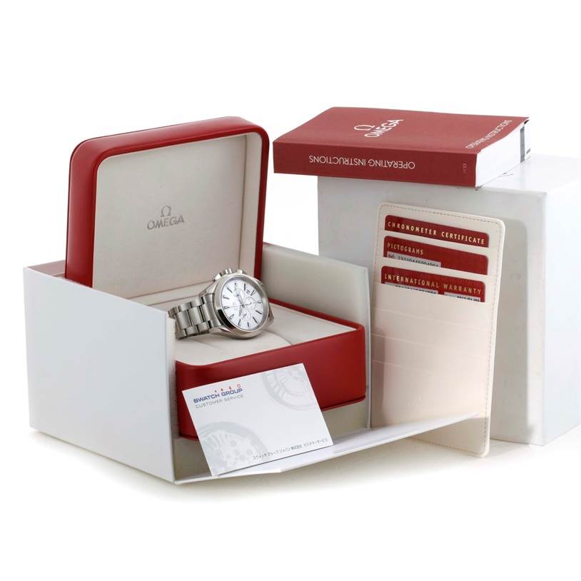The image shows an Omega Aqua Terra 231.10.44.50.04.001 Men's Stainless Steel White Dial 231.10.44.50.04.001 Men's Stainless Steel White Dial watch in its open box, along with a warranty card holder and instruction manual.