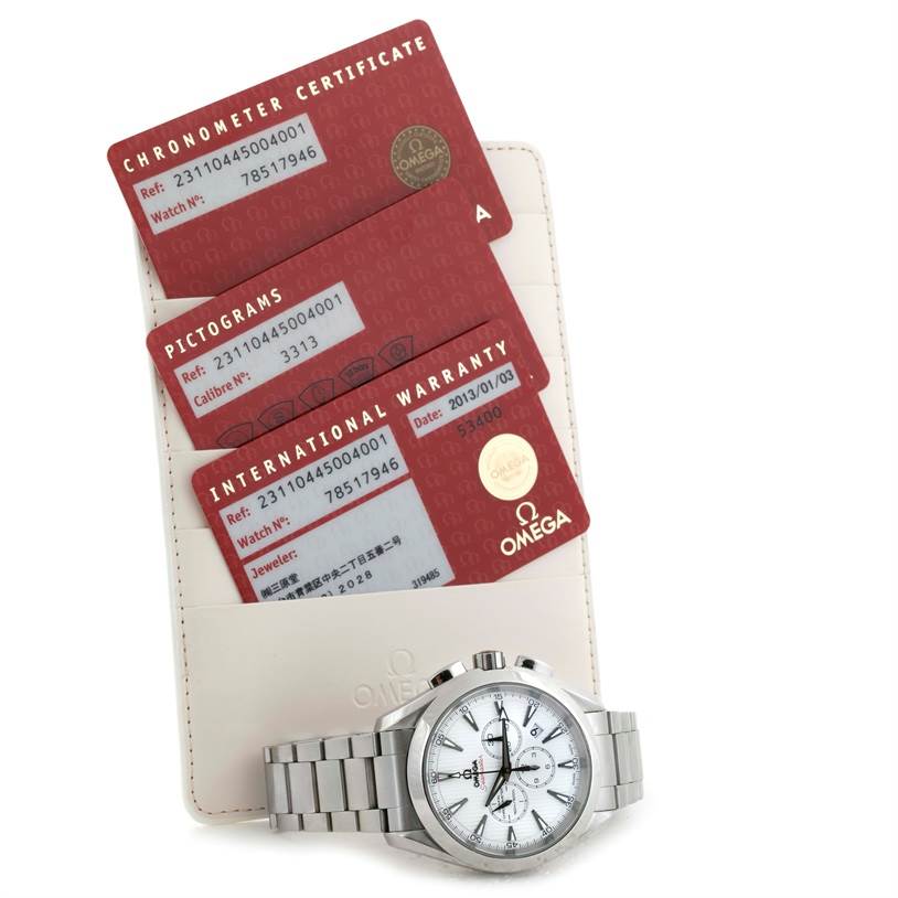 The image shows an Omega Aqua Terra 231.10.44.50.04.001 Men's Stainless Steel White Dial 231.10.44.50.04.001 Men's Stainless Steel White Dial watch along with its chronometer certificate, pictograms, and international warranty cards.