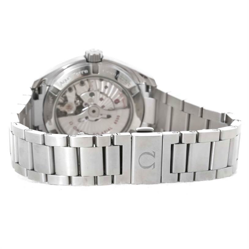 The image shows the back view of the Omega Aqua Terra 231.10.39.21.02.001 Men
s Stainless Steel Silver Dial 231.10.39.21.02.001 Men
s Stainless Steel Silver Dial watch, highlighting its metal bracelet and movement through the case back.