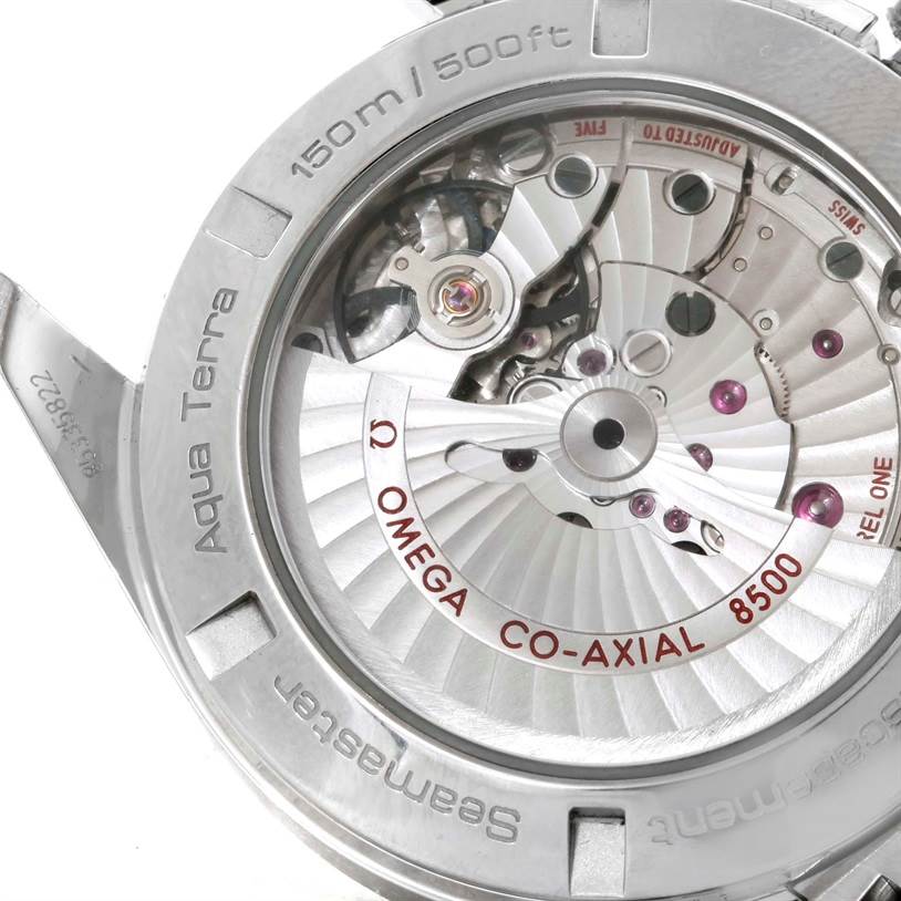 The image shows the back of the Omega Aqua Terra 231.10.42.21.01.001 Men
s Stainless Steel Black Dial 231.10.42.21.01.001 Men
s Stainless Steel Black Dial watch, revealing its intricate Co-Axial 8500 movement mechanism.