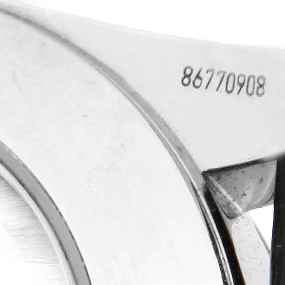The image shows a close-up of the serial number on the side of the case of the Omega Aqua Terra 231.12.42.21.01.001 Men's Stainless Steel Black Dial 231.12.42.21.01.001 Men's Stainless Steel Black Dial watch.