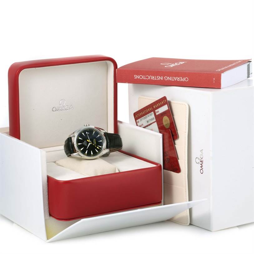 The Omega Aqua Terra 231.12.42.21.01.001 Men's Stainless Steel Black Dial 231.12.42.21.01.001 Men's Stainless Steel Black Dial watch is shown in its open box along with a red operating instructions booklet and warranty cards.