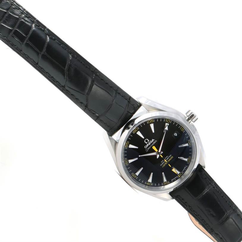 The image shows a tilted view of the Omega Aqua Terra 231.12.42.21.01.001 Men's Stainless Steel Black Dial 231.12.42.21.01.001 Men's Stainless Steel Black Dial watch, highlighting the watch face, bezel, and black leather strap.