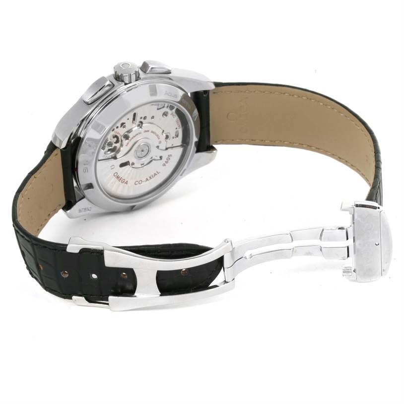 The image shows the back view of an Omega Aqua Terra 231.13.43.52.02.001 Men
s Stainless Steel Silver Dial 231.13.43.52.02.001 Men
s Stainless Steel Silver Dial watch, displaying its movement, clasp, and leather strap.