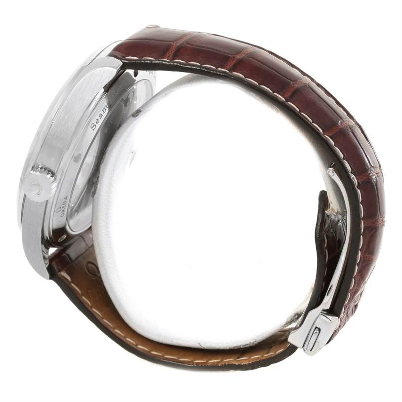 This side-view image of the Omega Aqua Terra 2806.52.37 Men
s Stainless Steel Black Dial 2806.52.37 Men
s Stainless Steel Black Dial watch shows the case, crown, and brown leather strap with the clasp.