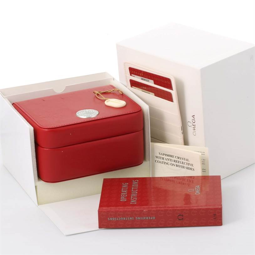 The image shows the Omega Aqua Terra 2806.52.37 Men
s Stainless Steel Black Dial 2806.52.37 Men
s Stainless Steel Black Dial watch packaging, including the red box, operating instructions, and warranty cards, from a top and side angle.