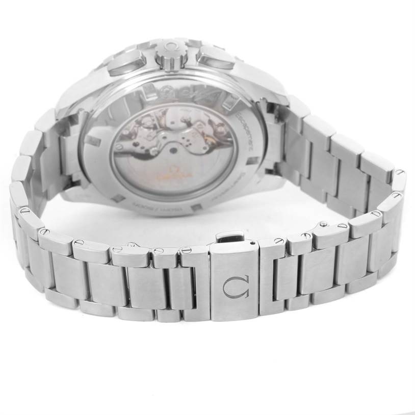 The image displays the Omega Aqua Terra 231.10.44.52.06.001 Men
s Stainless Steel Grey Dial 231.10.44.52.06.001 Men
s Stainless Steel Grey Dial watch from a rear angle, showcasing its transparent case back and metal bracelet.