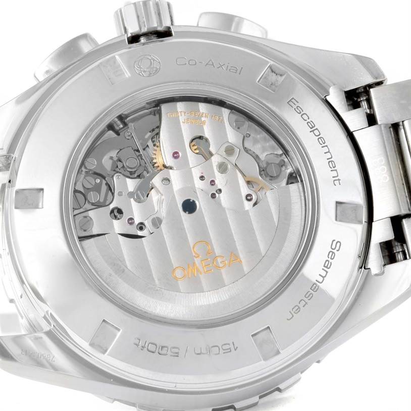 The image shows the back view of the Omega Aqua Terra 231.10.44.52.06.001 Men
s Stainless Steel Grey Dial 231.10.44.52.06.001 Men
s Stainless Steel Grey Dial watch, highlighting its Co-Axial escapement and inner mechanical parts.