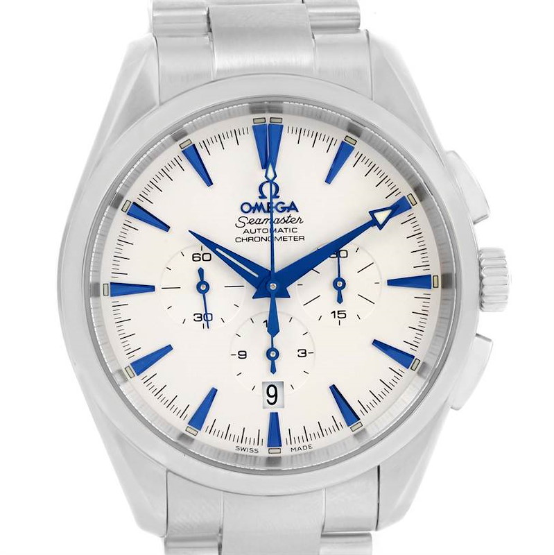 The image shows a front view of an Omega Aqua Terra watch, highlighting its white dial, blue markings, and stainless steel bracelet.