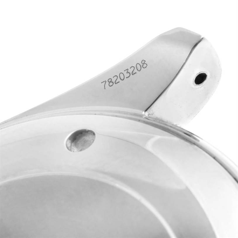 This is a close-up of the back casing of the Omega Aqua Terra 2512.52.00 Men
s Stainless Steel Black Dial 2512.52.00 Men
s Stainless Steel Black Dial watch, showing part of the serial number.