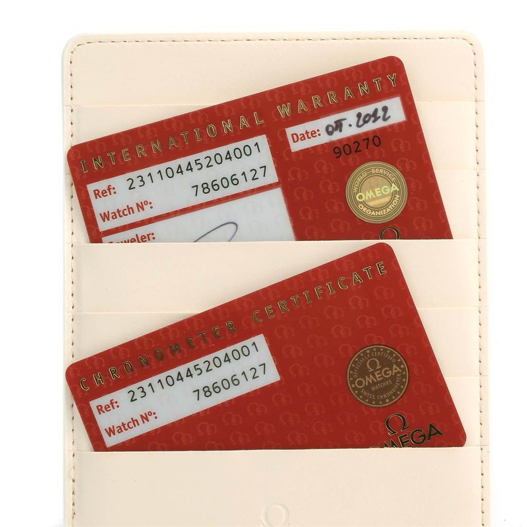 The image shows the international warranty and chronometer certificate cards for the Omega Aqua Terra 231.10.44.52.04.001 Men
s Stainless Steel White Dial 231.10.44.52.04.001 Men
s Stainless Steel White Dial watch.