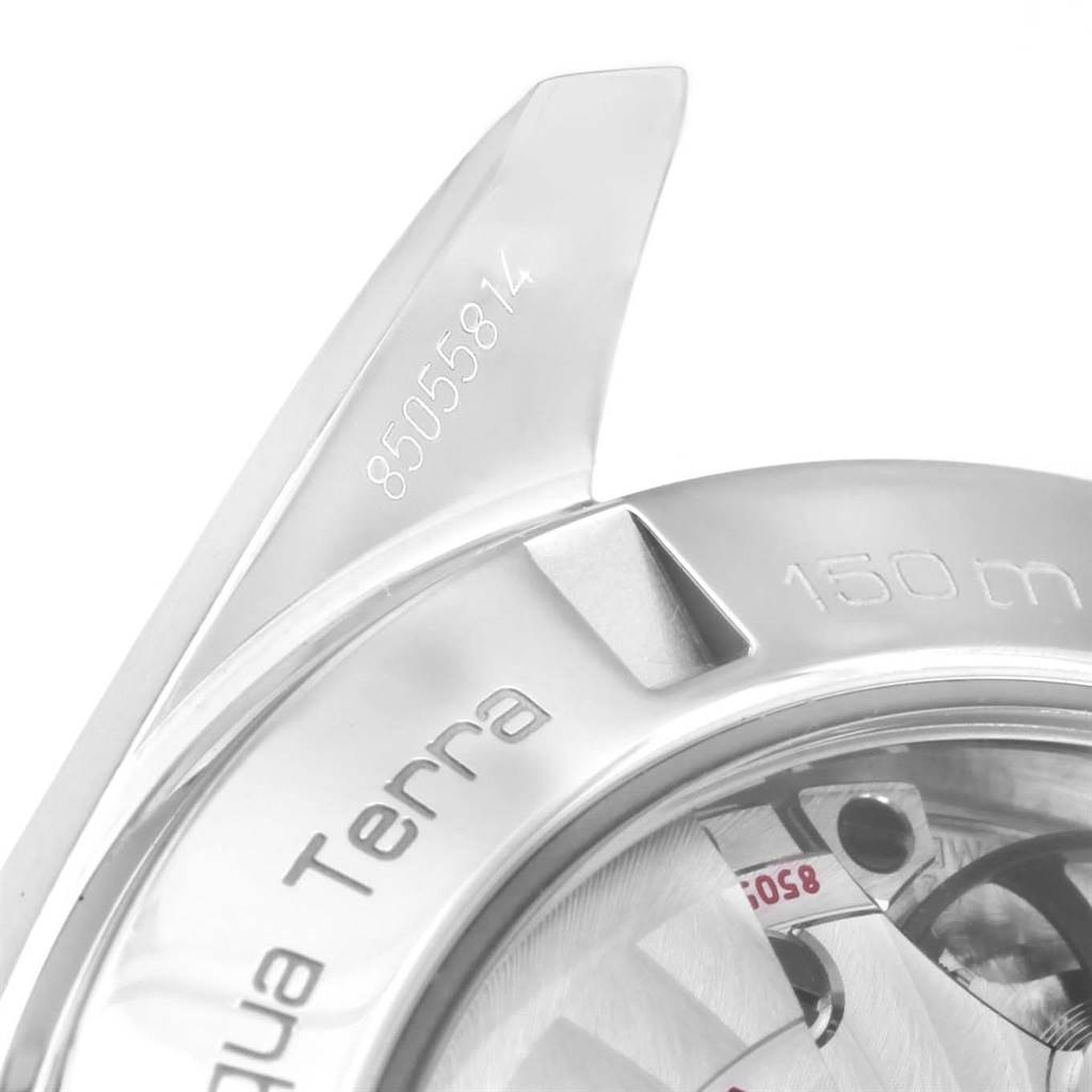 The image shows a close-up angle of the Omega Aqua Terra 231.10.42.21.06.001 Men's Stainless Steel Grey Dial 231.10.42.21.06.001 Men's Stainless Steel Grey Dial watch, focusing on its edge and part of the engraved details.