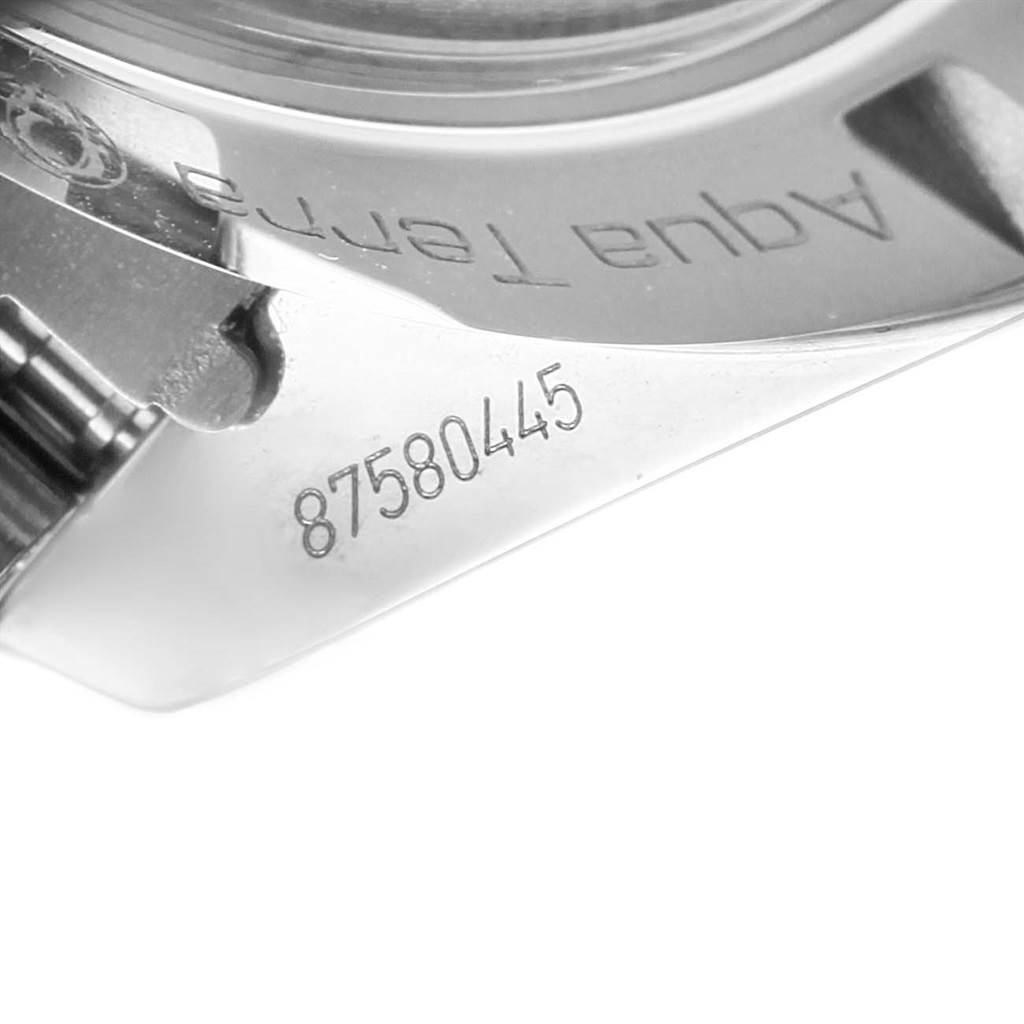 The image shows a close-up of the serial number and "Aqua Terra" engraving on the back case of an Omega Aqua Terra 231.10.42.21.03.004 Men
s Stainless Steel Blue Dial 231.10.42.21.03.004 Men
s Stainless Steel Blue Dial watch.