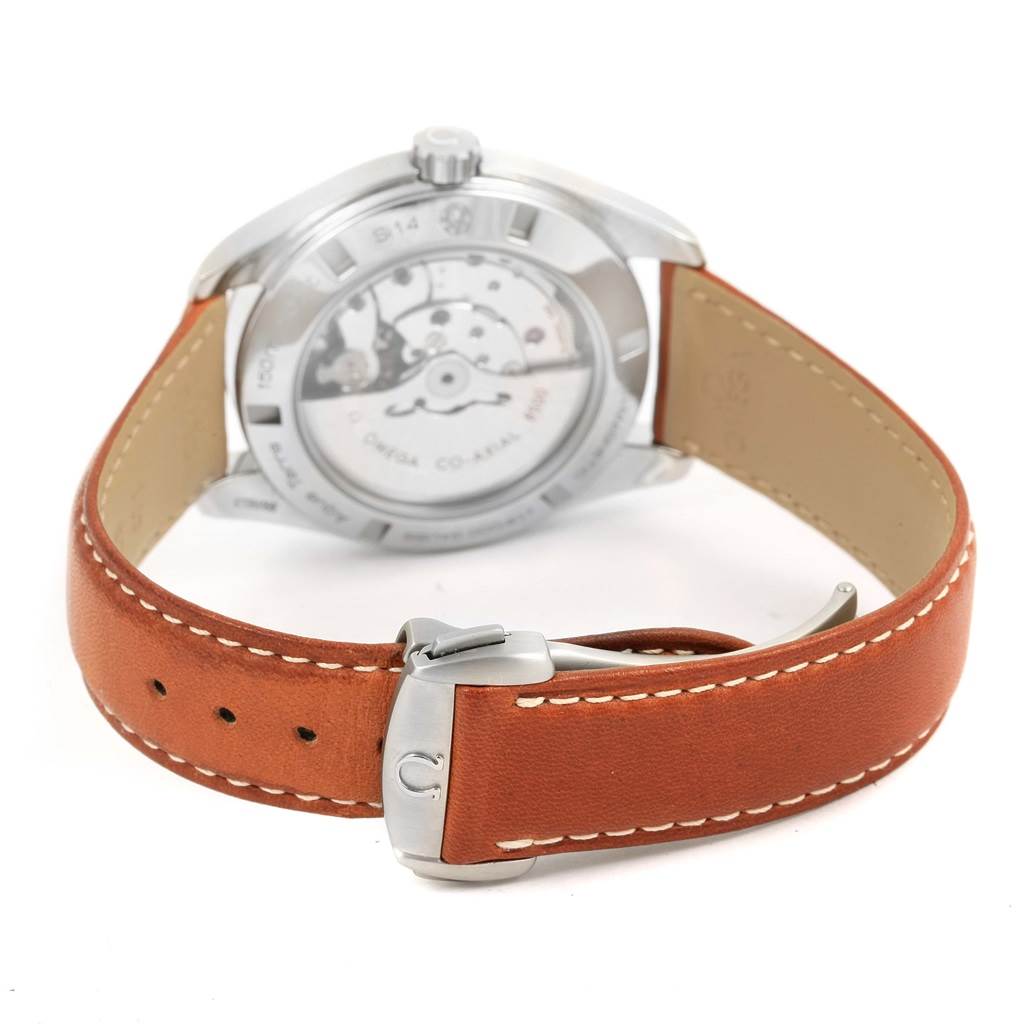 The image shows the back of the Omega Aqua Terra 231.12.42.21.01.002 Men
s Stainless Steel Black Dial 231.12.42.21.01.002 Men
s Stainless Steel Black Dial watch, highlighting the transparent case back and brown leather strap with a clasp.