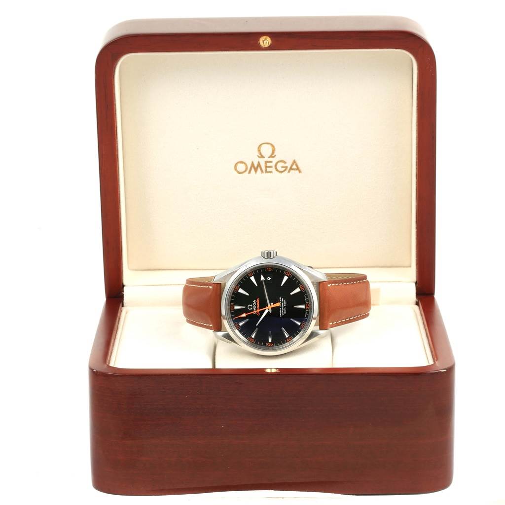 The Omega Aqua Terra 231.12.42.21.01.002 Men
s Stainless Steel Black Dial 231.12.42.21.01.002 Men
s Stainless Steel Black Dial watch is displayed front-facing in an open wooden box with a leather strap and black dial.