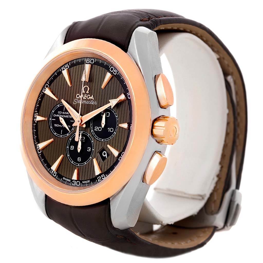 The image shows an Omega Aqua Terra 231.23.44.50.06.001 Men's Steel and Gold (two tone) Grey Dial 231.23.44.50.06.001 Men's Steel and Gold (two tone) Grey Dial model watch, angled to highlight the face, crown, and buttons.