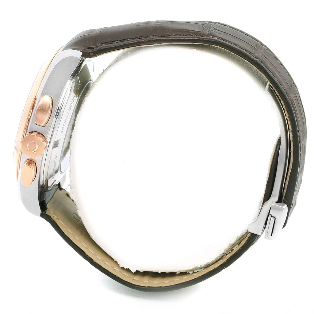 Side view of the Omega Aqua Terra 231.23.44.50.06.001 Men's Steel and Gold (two tone) Grey Dial 231.23.44.50.06.001 Men's Steel and Gold (two tone) Grey Dial watch showing the crown, pushers, and leather strap.