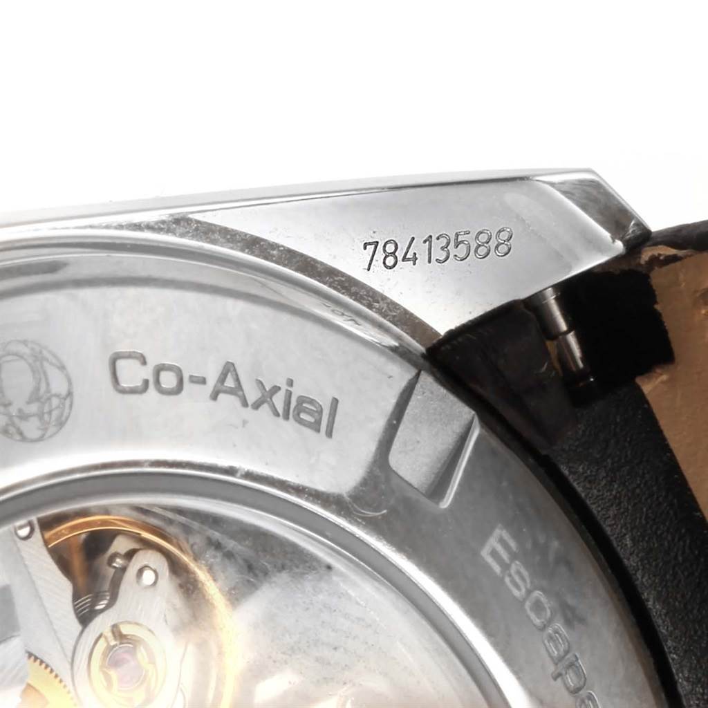 The image shows a close-up view of the back case of an Omega Aqua Terra 231.23.44.50.06.001 Men's Steel and Gold (two tone) Grey Dial 231.23.44.50.06.001 Men's Steel and Gold (two tone) Grey Dial Co-Axial watch, displaying the serial number and part of the movement.