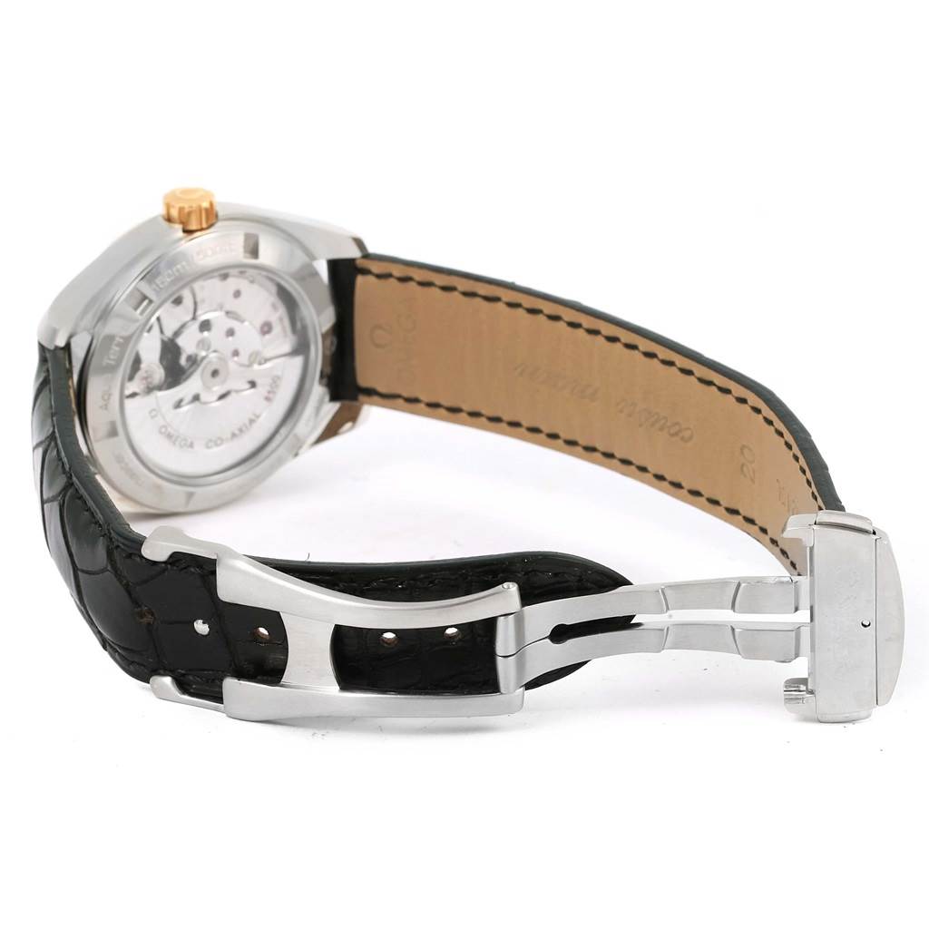 The image shows the back of the Omega Aqua Terra 231.23.39.21.55.002 Men's Steel and Gold (two tone) Mother of Pearl Dial 231.23.39.21.55.002 Men's Steel and Gold (two tone) Mother of Pearl Dial watch, highlighting its automatic movement and the leather strap with a clasp.