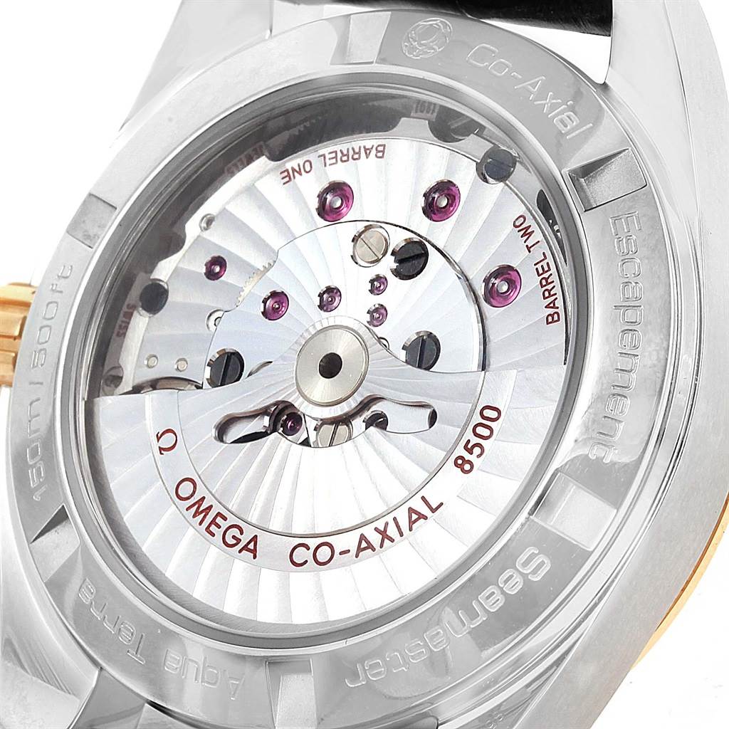 The image shows the transparent case back of the Omega Aqua Terra 231.23.39.21.55.002 Men's Steel and Gold (two tone) Mother of Pearl Dial 231.23.39.21.55.002 Men's Steel and Gold (two tone) Mother of Pearl Dial watch, displaying its Co-Axial 8500 movement.