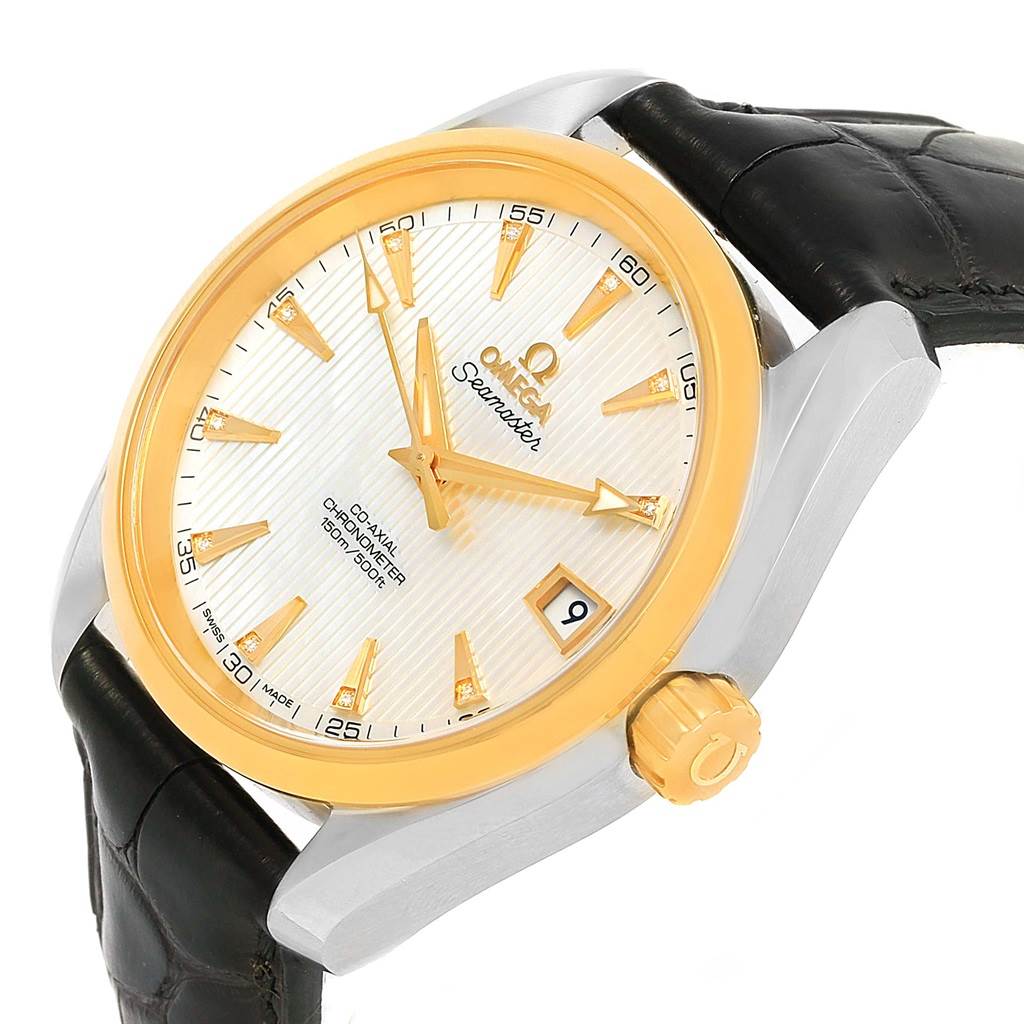 The Omega Aqua Terra 231.23.39.21.55.002 Men's Steel and Gold (two tone) Mother of Pearl Dial 231.23.39.21.55.002 Men's Steel and Gold (two tone) Mother of Pearl Dial watch is shown at a tilted angle, highlighting the dial, bezel, crown, and part of the leather strap.
