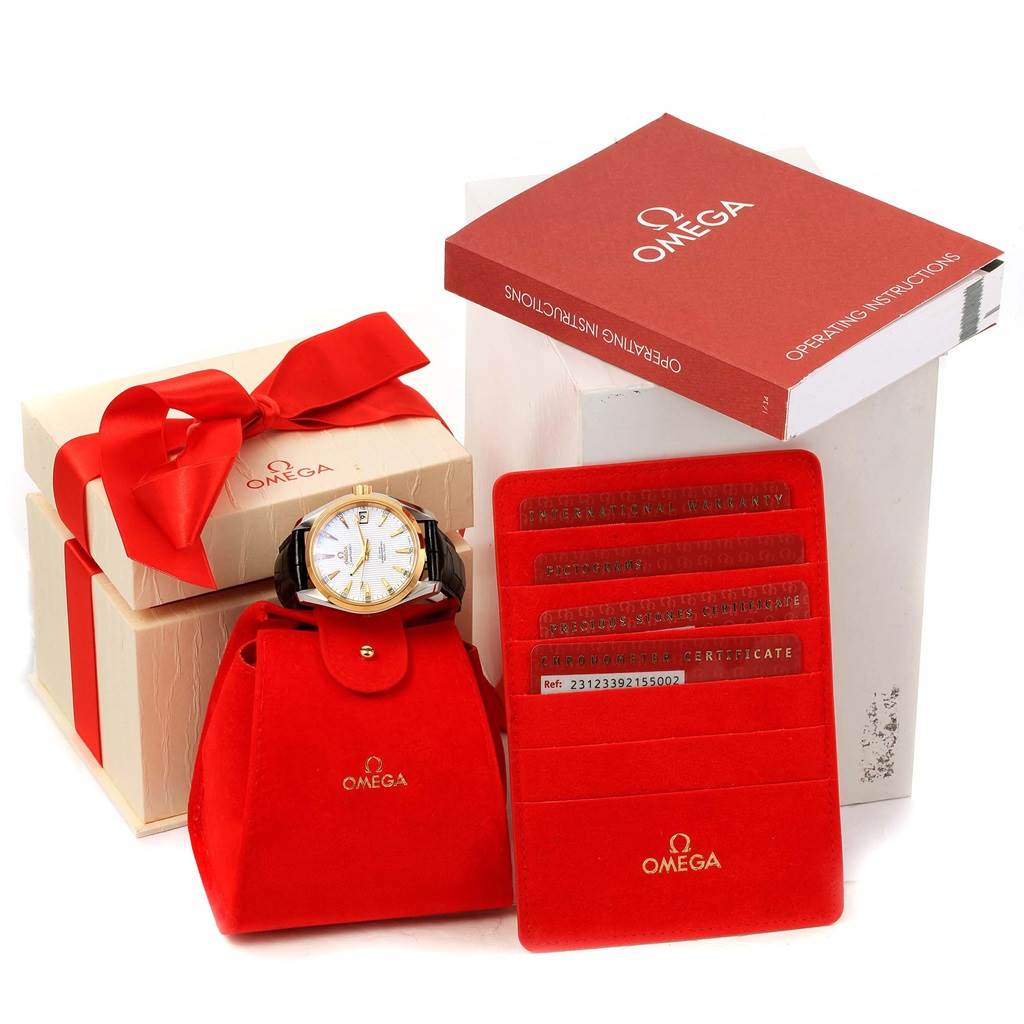 The Omega Aqua Terra 231.23.39.21.55.002 Men's Steel and Gold (two tone) Mother of Pearl Dial 231.23.39.21.55.002 Men's Steel and Gold (two tone) Mother of Pearl Dial watch is displayed front-facing along with its packaging, warranty cards, and operating instructions.