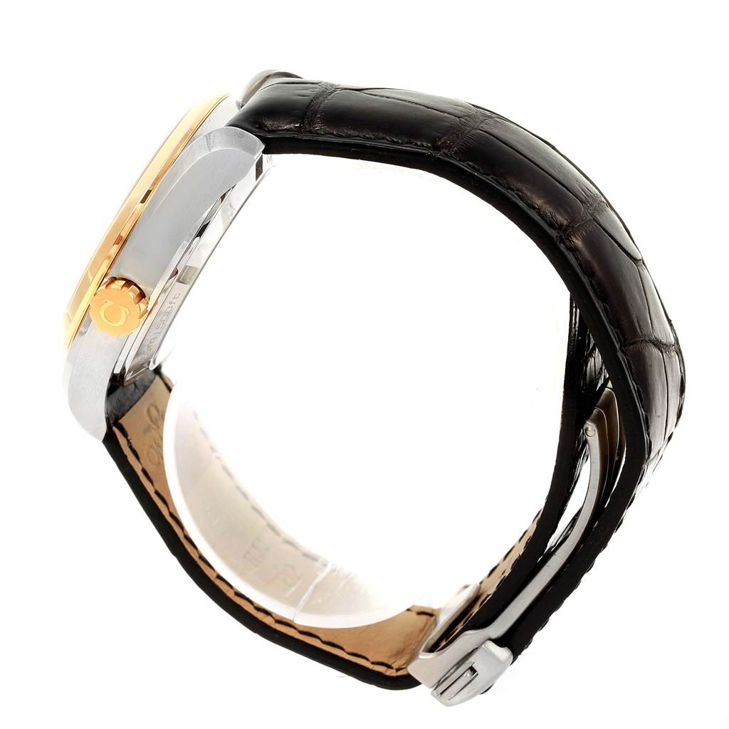 The image shows a side profile of the Omega Aqua Terra 231.23.39.21.55.002 Men's Steel and Gold (two tone) Mother of Pearl Dial 231.23.39.21.55.002 Men's Steel and Gold (two tone) Mother of Pearl Dial watch, highlighting the case, crown, and leather strap.