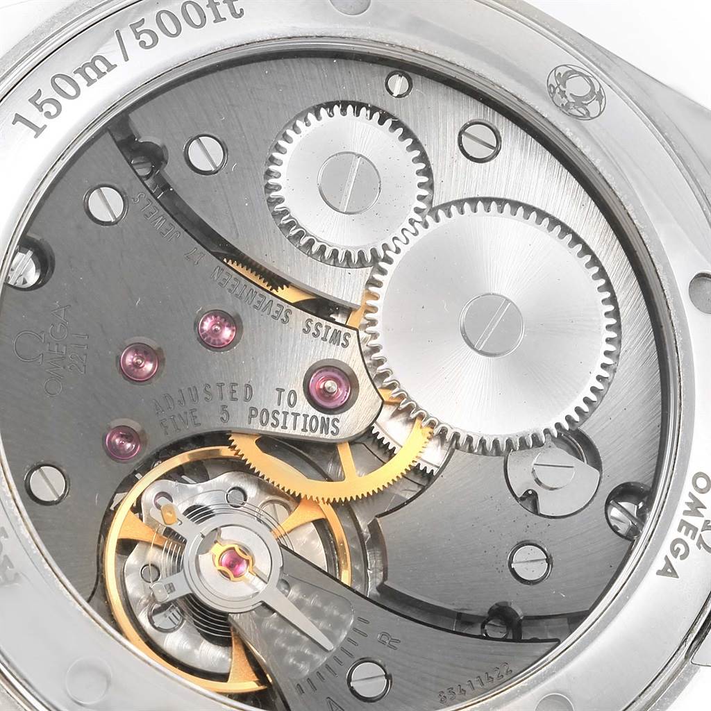 This is a close-up view of the internal mechanical movement of an Omega Aqua Terra 231.13.49.10.06.001 Men
s Stainless Steel Grey Dial 231.13.49.10.06.001 Men
s Stainless Steel Grey Dial watch, showing gears and components.