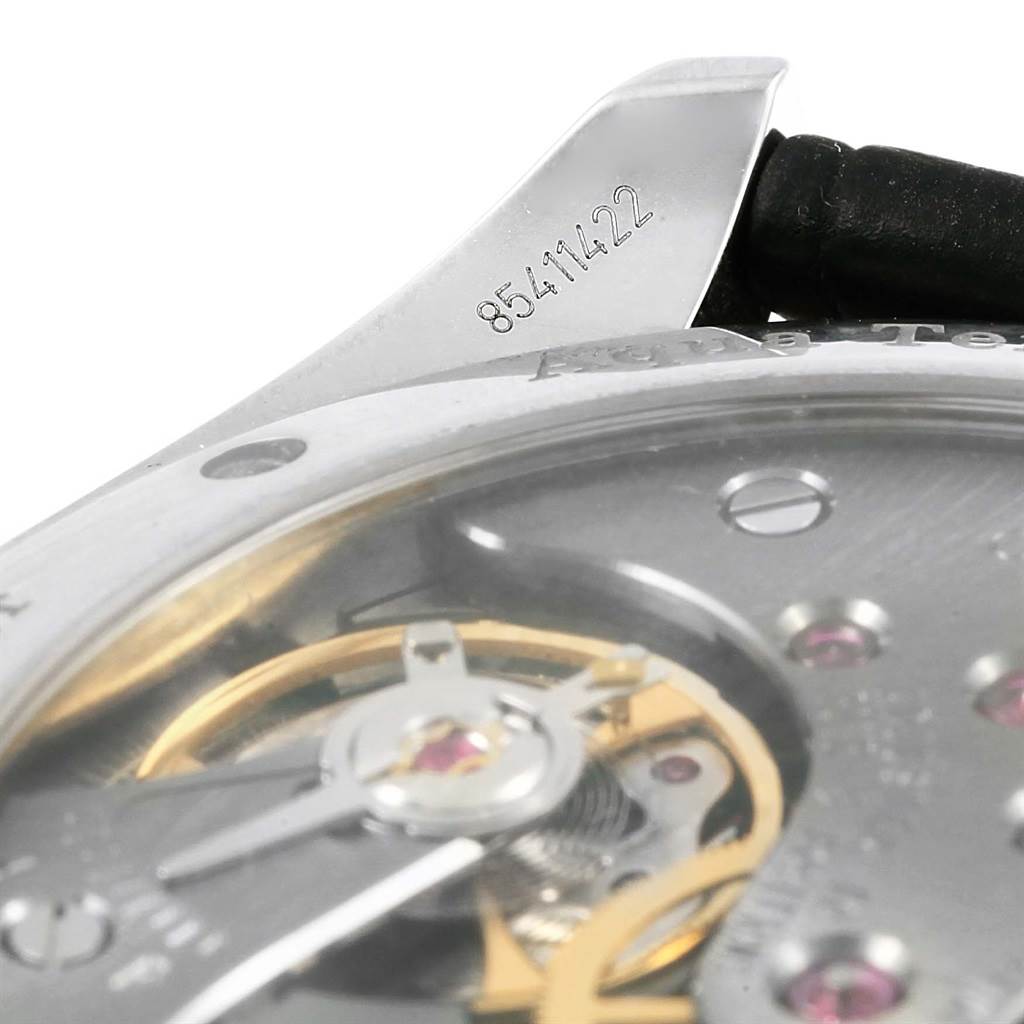 This image shows a close-up of the movement and serial number of an Omega Aqua Terra 231.13.49.10.06.001 Men
s Stainless Steel Grey Dial 231.13.49.10.06.001 Men
s Stainless Steel Grey Dial watch from the side angle.