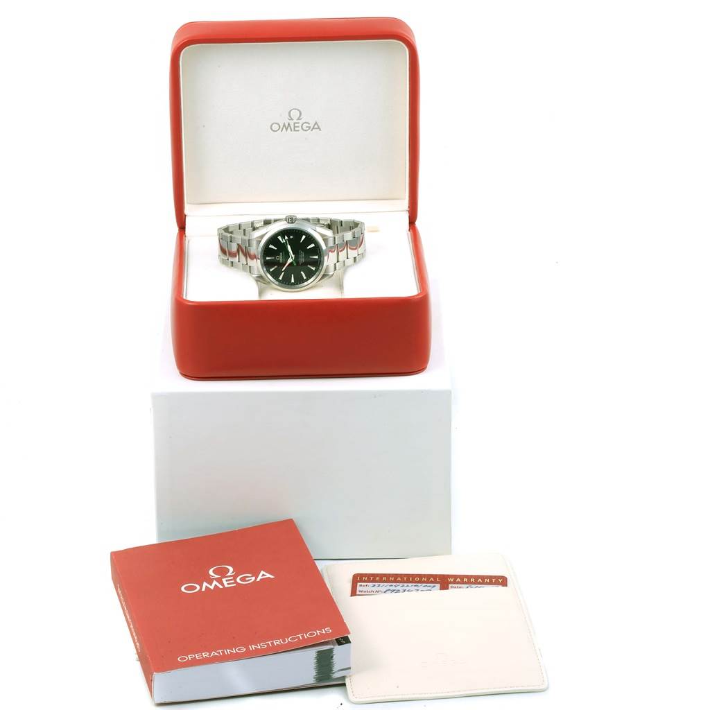 The Omega Aqua Terra 231.10.42.21.01.004 Men
s Stainless Steel Black Dial 231.10.42.21.01.004 Men
s Stainless Steel Black Dial watch is shown from the front in its box, along with the operating instructions and warranty card.