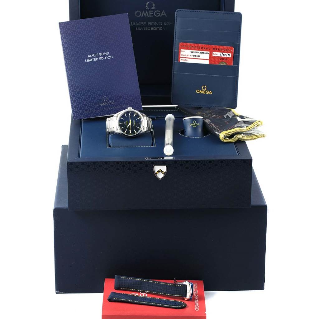 The image shows an Omega Aqua Terra 231.10.42.21.03.004 Men's Stainless Steel Blue Dial 231.10.42.21.03.004 Men's Stainless Steel Blue Dial watch, with accessories including a booklet, additional straps, and packaging from a top-down angle.