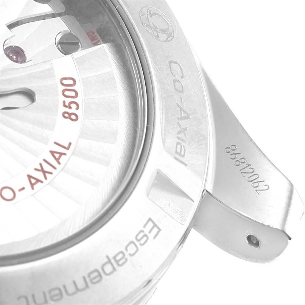 The image shows a close-up of the back of the Omega Aqua Terra 231.10.42.21.02.002 Men
s Stainless Steel Silver Dial 231.10.42.21.02.002 Men
s Stainless Steel Silver Dial watch, highlighting the Co-Axial 8500 movement and serial number.