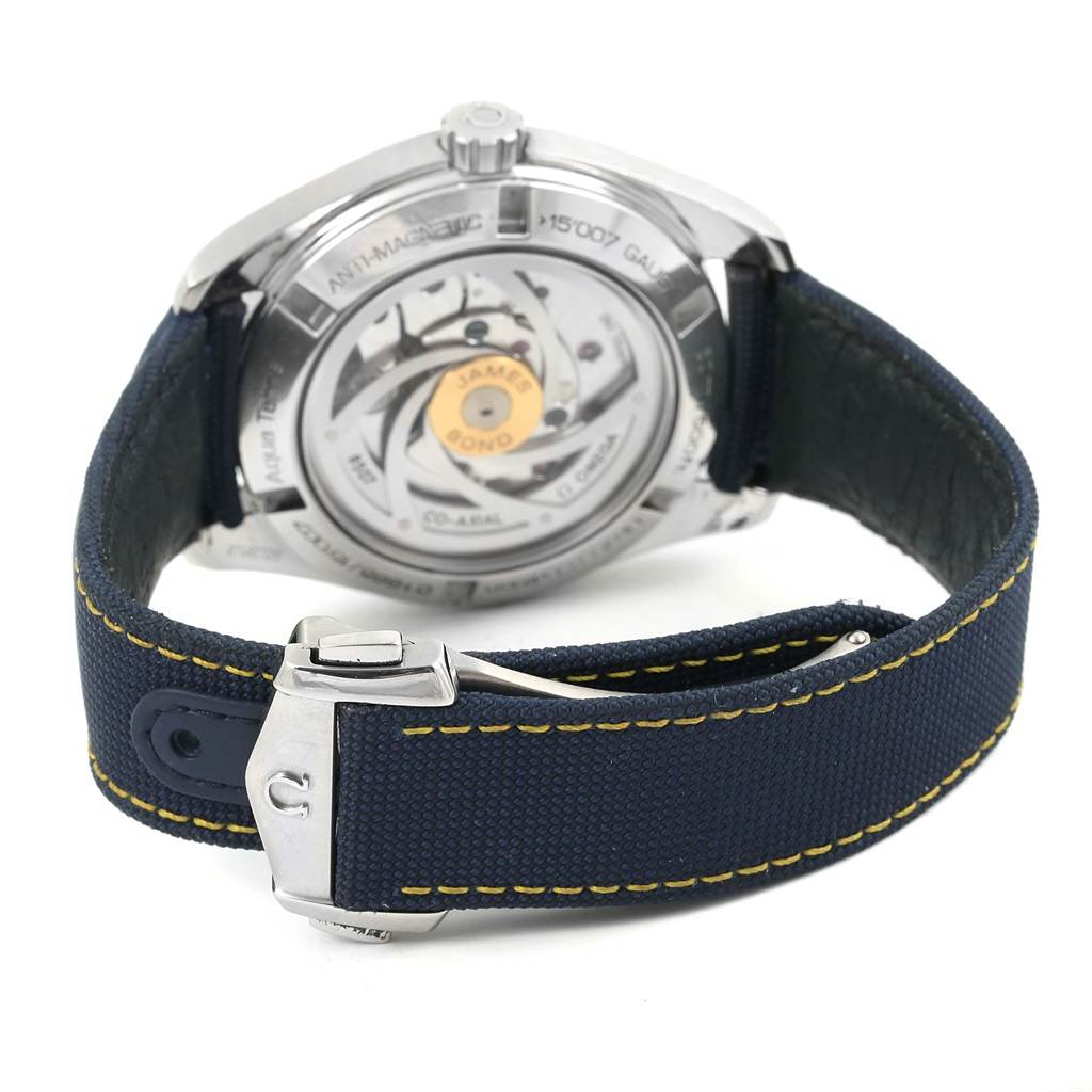 The image shows the back view of an Omega Aqua Terra 231.10.42.21.03.004 Men's Stainless Steel Blue Dial 231.10.42.21.03.004 Men's Stainless Steel Blue Dial watch, displaying the movement and the strap with clasp.