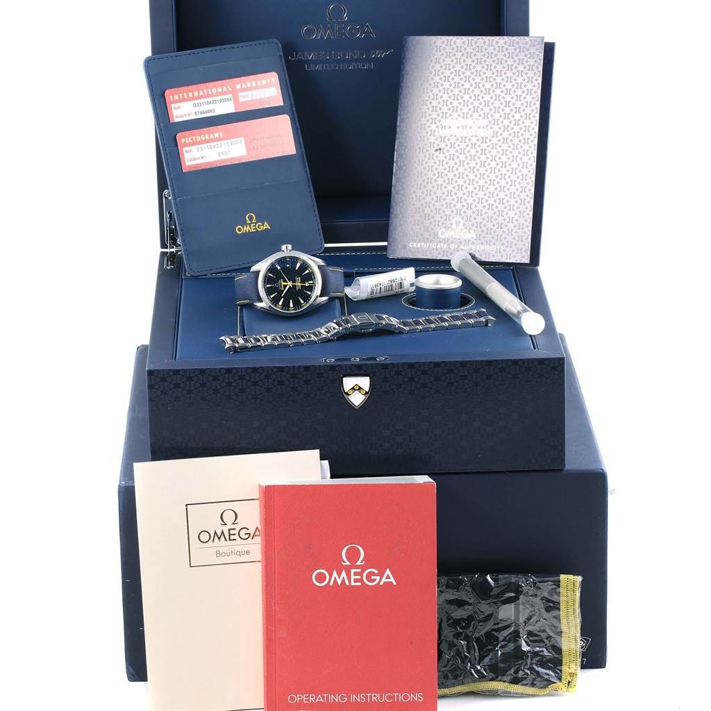 The Omega Aqua Terra 231.10.42.21.03.004 Men's Stainless Steel Blue Dial 231.10.42.21.03.004 Men's Stainless Steel Blue Dial watch is displayed with its accessories, including booklets, warranty cards, tools, and an additional strap.