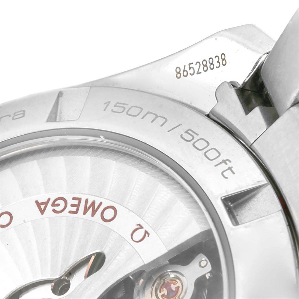 The image shows a close-up angle of the case back of an Omega Aqua Terra 231.10.39.21.03.001 Men's Stainless Steel Blue Dial 231.10.39.21.03.001 Men's Stainless Steel Blue Dial watch, displaying its serial number and water resistance.