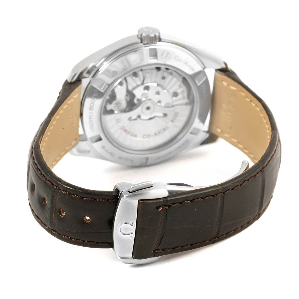 The image shows the back of an Omega Aqua Terra 231.13.42.21.02.002 Men's Stainless Steel Silver Dial 231.13.42.21.02.002 Men's Stainless Steel Silver Dial watch, highlighting its transparent case back and brown leather strap.