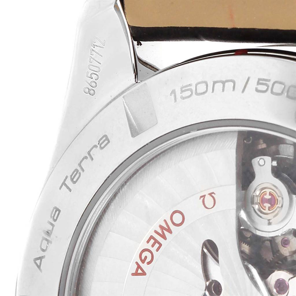 The image shows a close-up of the back and partially exposed gears of the Omega Aqua Terra 231.13.42.21.02.002 Men's Stainless Steel Silver Dial 231.13.42.21.02.002 Men's Stainless Steel Silver Dial watch.