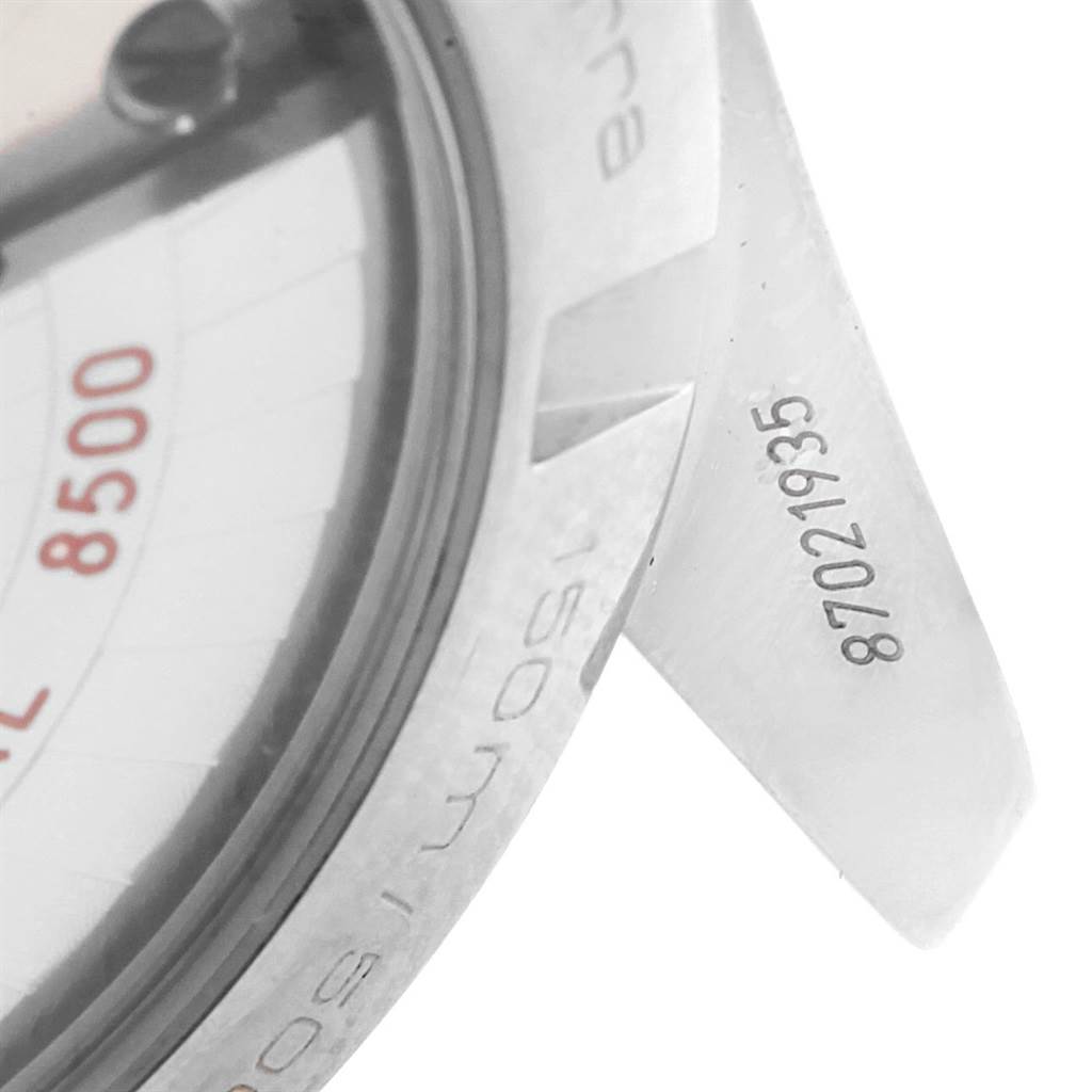 This image shows a close-up of the side and part of the dial of the Omega Aqua Terra 231.10.39.21.03.001 Men's Stainless Steel Blue Dial 231.10.39.21.03.001 Men's Stainless Steel Blue Dial, including the serial number and model inscriptions.