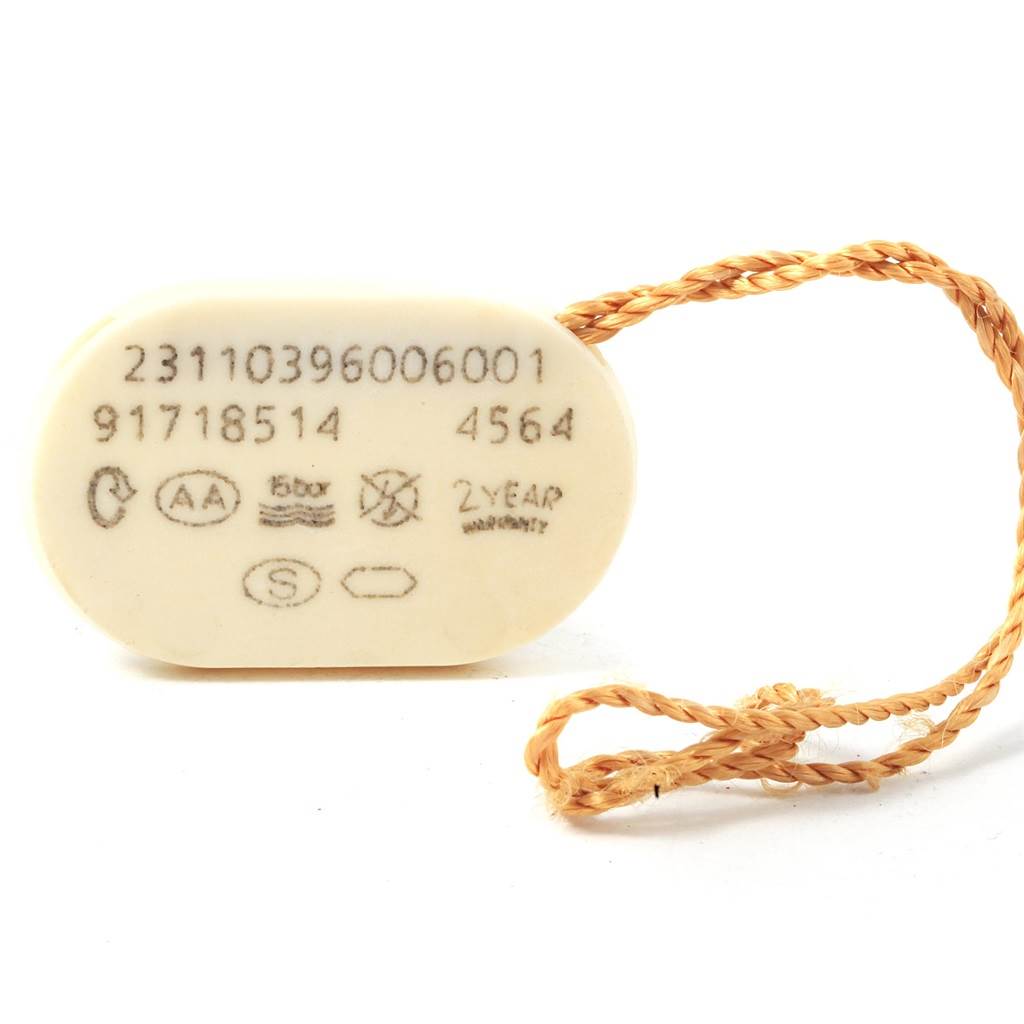 This image shows the tag for an Omega Aqua Terra 231.10.39.60.06.001 Men's Stainless Steel Grey Dial 231.10.39.60.06.001 Men's Stainless Steel Grey Dial watch, featuring model numbers and warranty information.