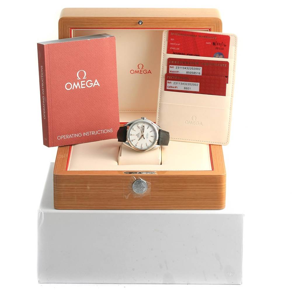 The Omega Aqua Terra 231.13.43.22.02.002 Men's Stainless Steel Silver Dial 231.13.43.22.02.002 Men's Stainless Steel Silver Dial watch is displayed in an open box, along with the operating instructions and a certificate holder.
