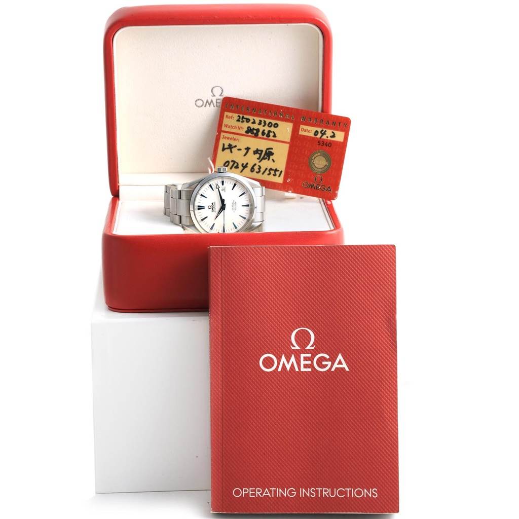 The Omega Aqua Terra 2502.33.00 Men's Stainless Steel White Dial 2502.33.00 Men's Stainless Steel White Dial watch is displayed in its box, with a warranty card and an operating instructions booklet in front.